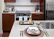 Thumbnail 17 of 19 - Model Suite Kitchen