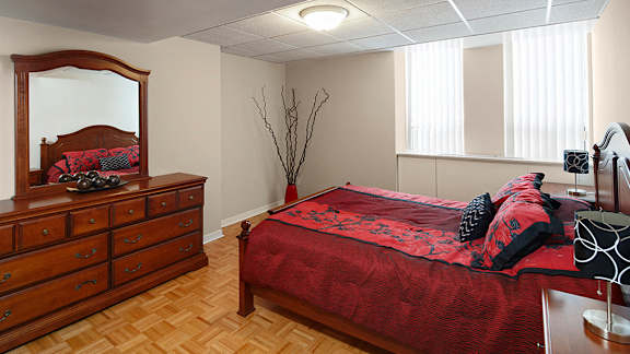 Bedroom with Dresser and Mirror and Queen Bedset