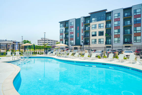 a swimming pool at aria on the bay apartments in downtownainsboro ga