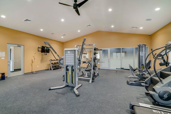 the gym that has a lot of exercise equipment