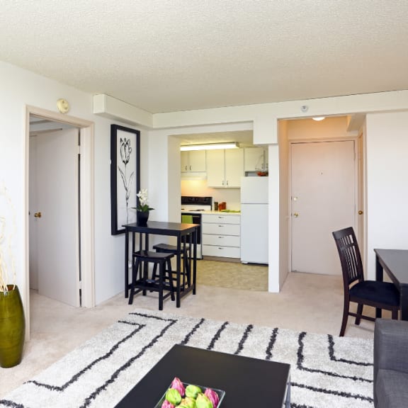 a living room with a dining room and a kitchen