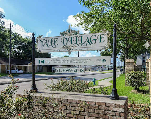 a sign for the lake magic theater on the corner of a street