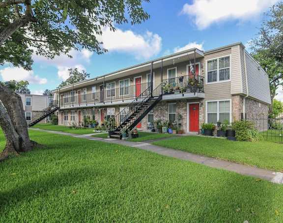 our apartments are located in a quiet neighborhood with grass