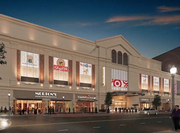 an artist's rendering of the redeveloped woolworths store on the corner of main street
