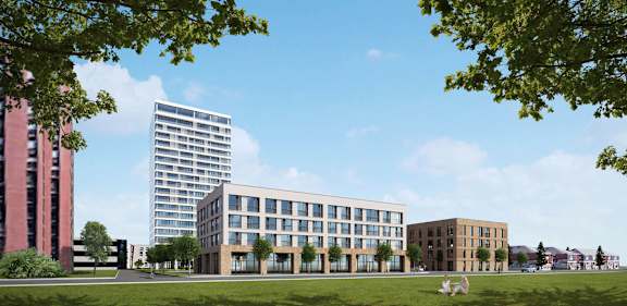 A modern building complex with a mix of residential and commercial buildings.