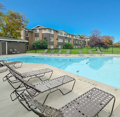 our apartments have a resort style pool with chaise lounge chairs