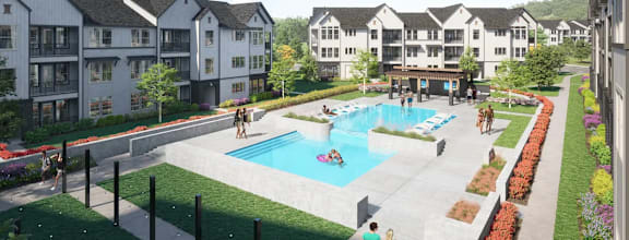 A swimming pool surrounded by a grassy area and apartment buildings.