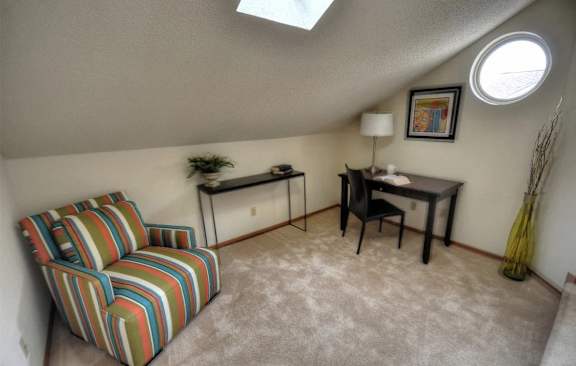 a living room with a couch and a table