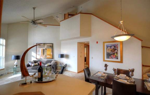 a view of the living room and dining room from the kitchen