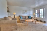 a living room with a couch and a coffee table
