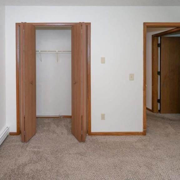 a bathroom with a sink and a toilet and a shower