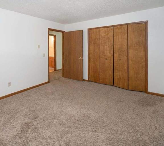 a living room with a couch and a table and a television
