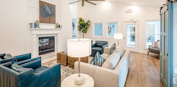 Living and sleeping area in studio apartment with accent wall