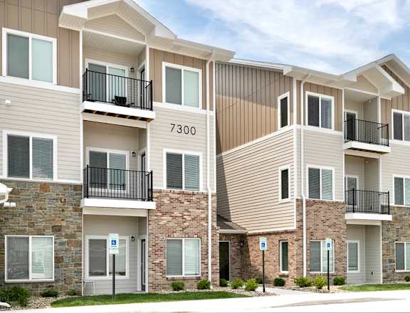 Apartment building with the number 7300 on the front.