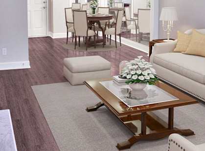A modern living room with a glass coffee table and a dining table with chairs at Lenox Village Apartments, Atlanta, Georgia