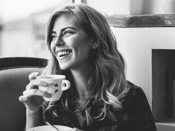 woman drinking coffee