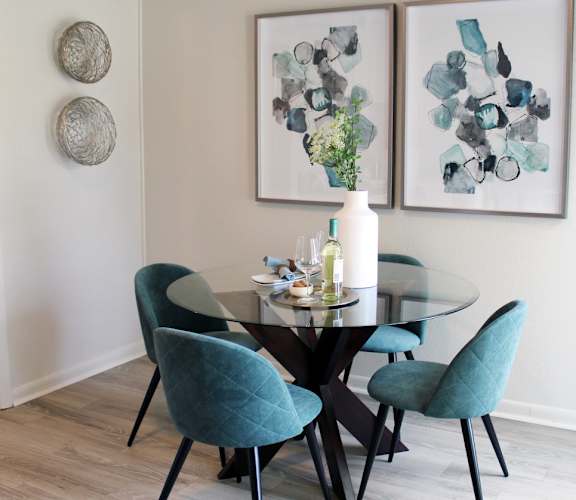 Huntsville Landing's model apartment home dining room with a table and chairs
