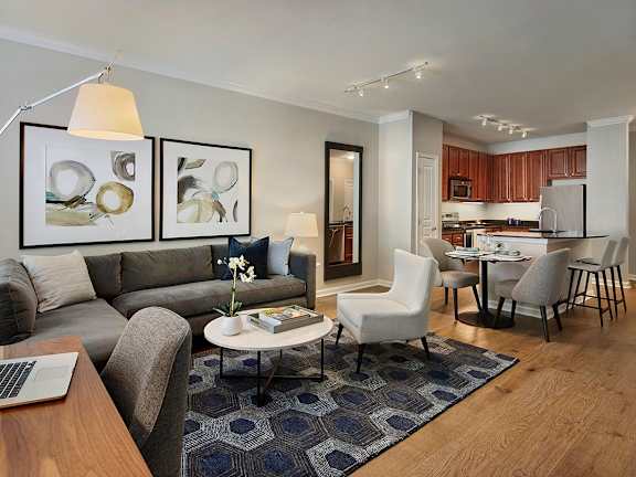 a living room with a couch and a coffee table at AVE Union