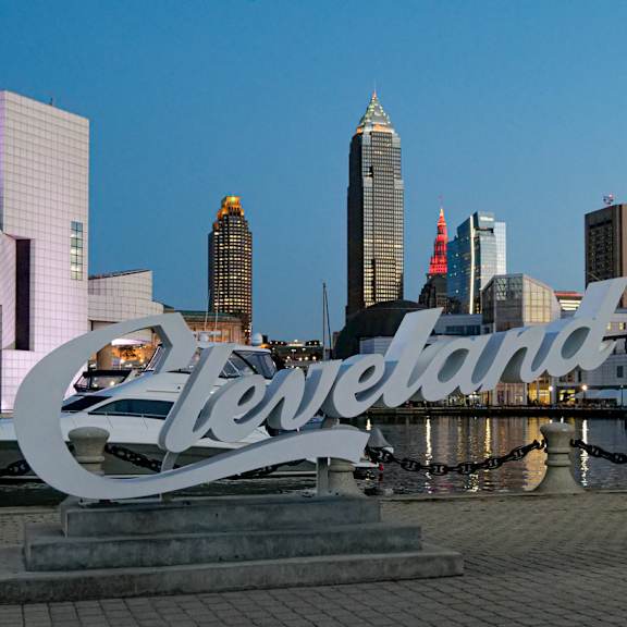 A large sign that says Cleveland in front of a city skyline. at Park Lamont Apartments & Townhomes, Ohio