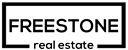 a white and black logo with the word freestone and red estate