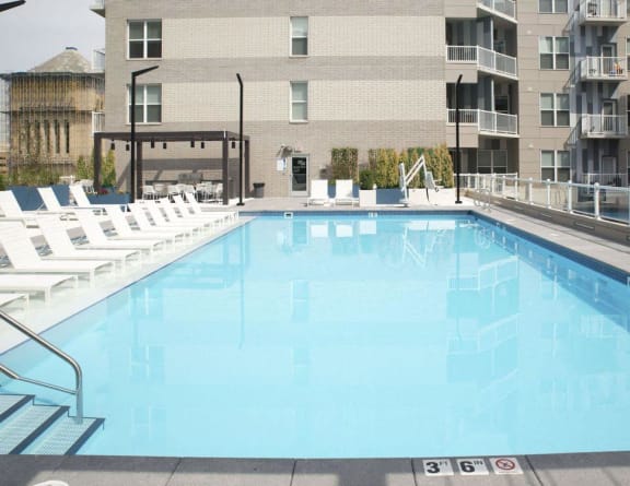 our resort style pool is next to the building of our apartments