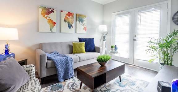 a living room with a couch and a coffee table