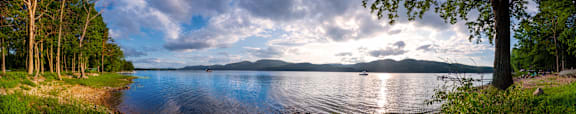 a view of a lake with mountains in the background