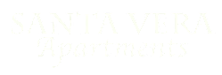 A brown sign that says "Santa Vera Apartments".