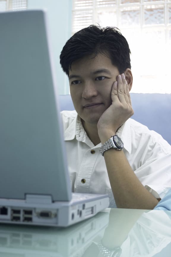 man using laptoop