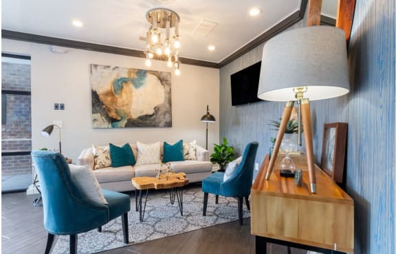 an open living room and dining room with a table and chairs
