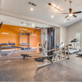 Fitness Center With Outside View at Foxborough Apartments, Irving, TX, Texas