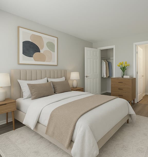 A bedroom with a large bed and a painting on the wall.