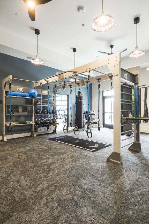 the gym at the flats at big tex apartments