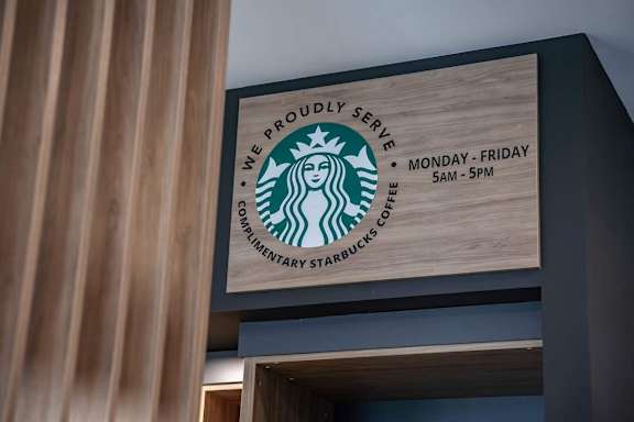 A Starbucks sign at Cadence at Griesbach, Edmonton, AB, T5E 1Y8