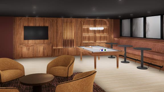 A room with a pool table, chairs, and a television.