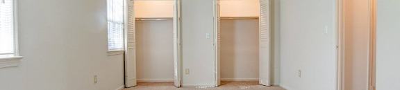 Large bedroom with two large closets with plenty of storage