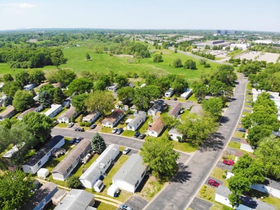 an aerial view of a building complex with a road