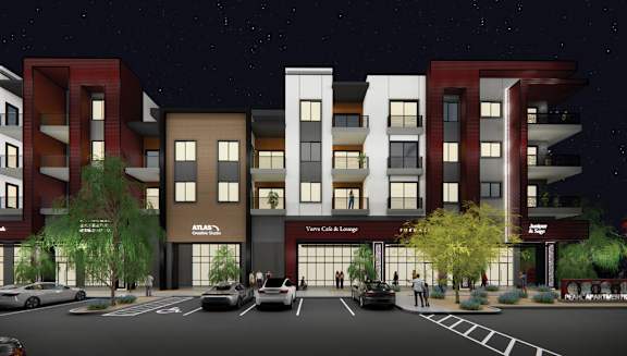 Pearl rendering at night with cars parked in front