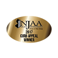 A gold oval shaped award for the CURB APPEAL WINNER.