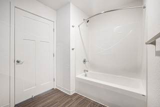 Bathroom with bathtub and shower at Eagle Ridge Apartment Homes, Traverse City
