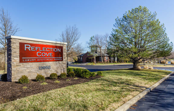 Property sign at Reflection Cove Apartments, Manchester, MO, 63021