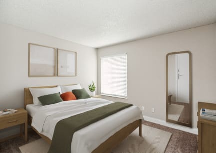 a bedroom with a bed and a mirror