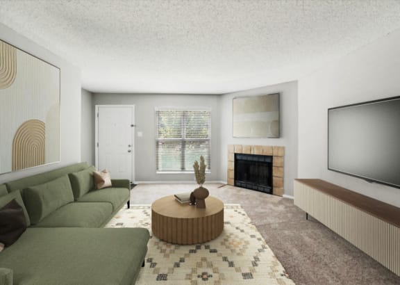 a living room with a green couch and a television