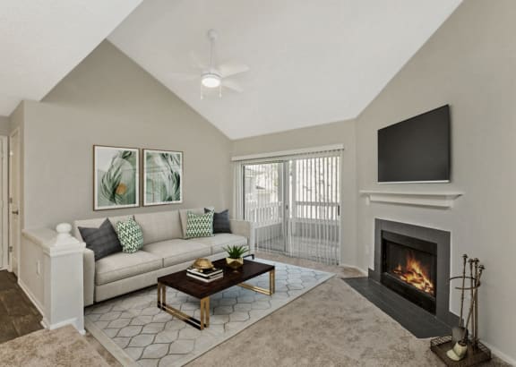 a living room with a fireplace and a couch