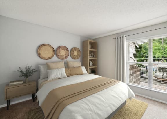 the preserve at ballantyne commons bedroom with bed and large window