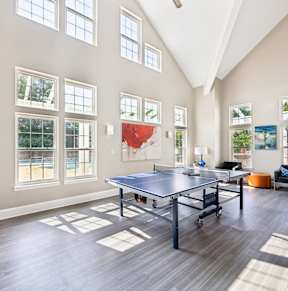 the preserve at ballantyne commons spacious game room with table tennis