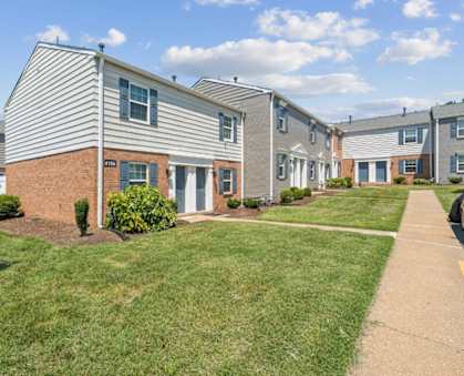 A building with the word  at Staples Mill Townhomes Apartments, Richmond 23228