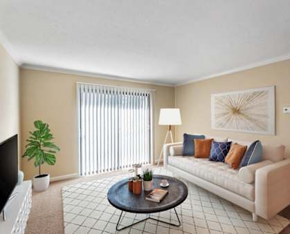 a living room with a couch and a coffee table