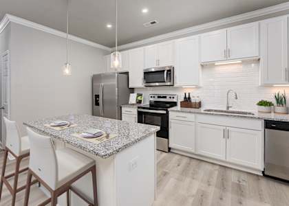 Kitchen with island at The Reserve at Mayfaire Apartments, Wilmington, NC, 28405