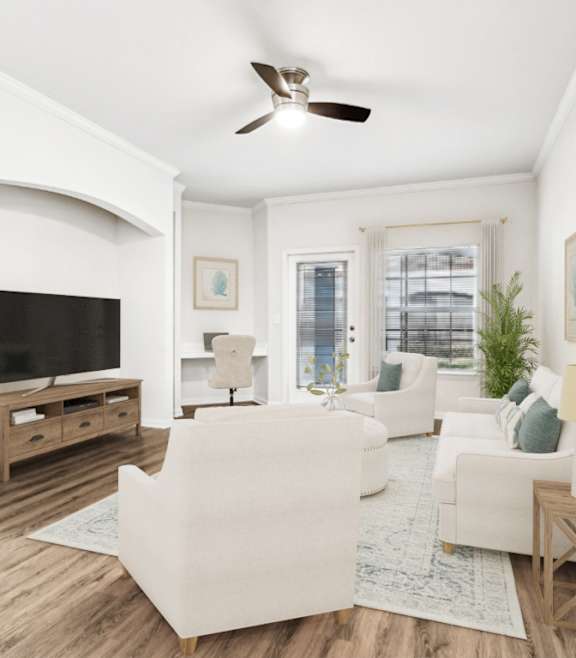 a living room filled with furniture and a ceiling fan  at Ballantrae Apartments, Sanford, FL, 32771